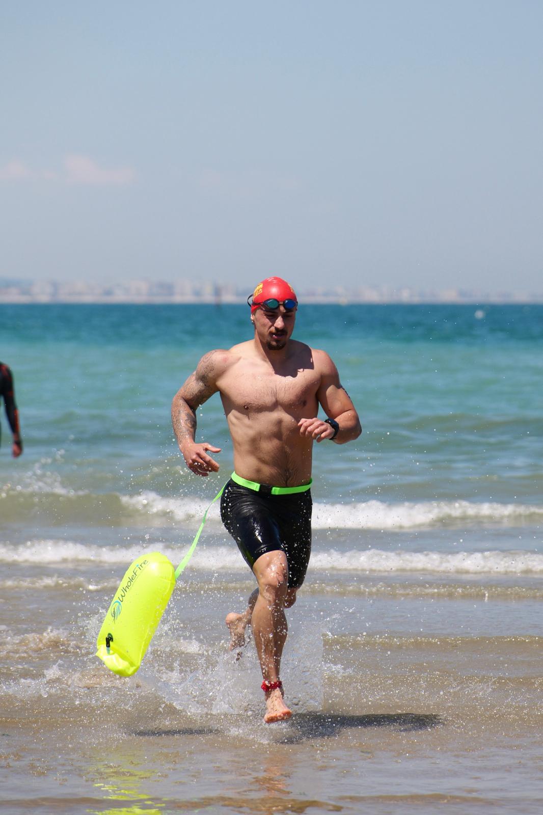 Running toward the finish at the OCEANMAN Cattolica 5K Open Water Race 2026.